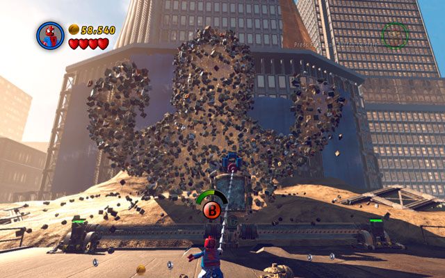 Gdy obie maszyny staną się aktywne, przejdź do centralnej części planszy i skorzystaj z szóstego zmysłu Spider-Mana - Sandman | Bossowie w LEGO Marvel Super Heroes - LEGO Marvel Super Heroes - poradnik do gry