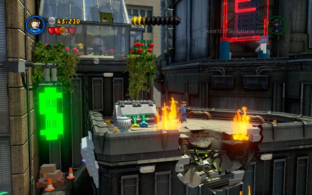 Trzeci znajduje się naprzeciwko neonu HOTEL, pod szklarnią - Times Square Off | Zestawy MiniKit w LEGO Marvel Super Heroes - LEGO Marvel Super Heroes - poradnik do gry