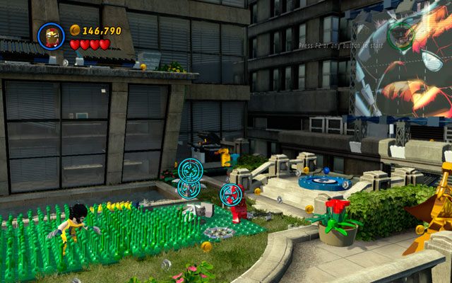 Przy billboardzie ze Spider-Manem wystrzel Iron Manem kilka rakiet w srebrny kwietnik, z jego resztek montując pompę - Times Square Off | Zestawy MiniKit w LEGO Marvel Super Heroes - LEGO Marvel Super Heroes - poradnik do gry