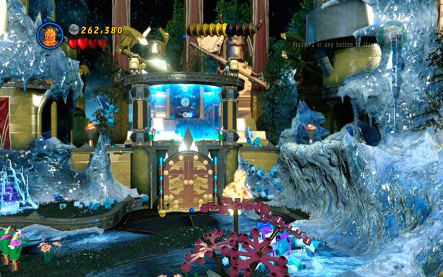 Drugi sopel z kwiatem umieszczono przed bramą, nad którą wznosi się pole siłowe - Bifrosty Reception | Zestawy MiniKit w LEGO Marvel Super Heroes - LEGO Marvel Super Heroes - poradnik do gry