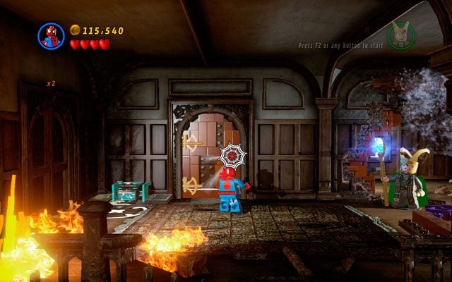 Po przejściu do nowego pomieszczenia wybierz Spider-Mana i strzel siecią w uchwyt na drzwiach obok - Juggernauts and Crosses | Zestawy MiniKit w LEGO Marvel Super Heroes - LEGO Marvel Super Heroes - poradnik do gry