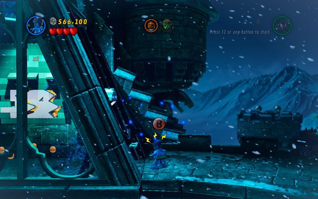 Na tym samym poziomie wybierz postać z dobrym węchem albo szóstym zmysłem i podejdź do centralnej wieży od prawej strony (po blankach u góry) - Doctor in the House | Zestawy MiniKit w LEGO Marvel Super Heroes - LEGO Marvel Super Heroes - poradnik do gry