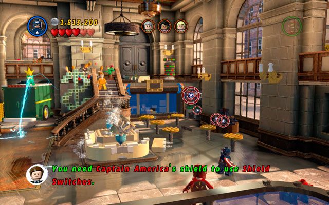 Będąc w środku budynku skręć w prawo i rzuć Kapitanem Ameryką w uchwyt na tarczę, który umieszczono nad wodą - A Shock Withdrawal | Bonusowe misje Deadpoola | LEGO Marvel Super Heroes - LEGO Marvel Super Heroes - poradnik do gry