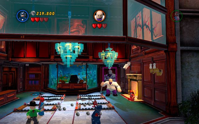 Poczekaj, aż wróg przeskoczy na drugi koniec sali, a następnie wyceluj tarczą Kapitana Ameryki we wrażliwy punkt drugiego żyrandola - Feeling Fisky | Bonusowe misje Deadpoola | LEGO Marvel Super Heroes - LEGO Marvel Super Heroes - poradnik do gry