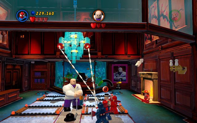 W ostatniej rundzie podejdź Spider-Manem do centrum sali i pociągnij za dwa uchwyty na trzecim żyrandolu - Feeling Fisky | Bonusowe misje Deadpoola | LEGO Marvel Super Heroes - LEGO Marvel Super Heroes - poradnik do gry