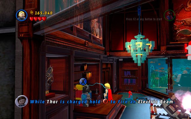 Skręć w lewo i odszukaj akumulator znajdujący się za ladą - Feeling Fisky | Znajdźki na bonusowych poziomach | LEGO Marvel Super Heroes - LEGO Marvel Super Heroes - poradnik do gry