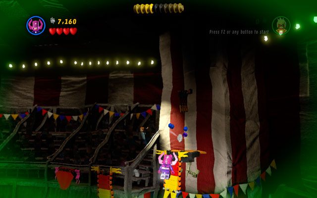 Wybierz dowolną latającą postać, po czym skieruj się w prawo - Stunt Show Surprise | Znajdźki na bonusowych poziomach - LEGO Marvel Super Heroes - poradnik do gry