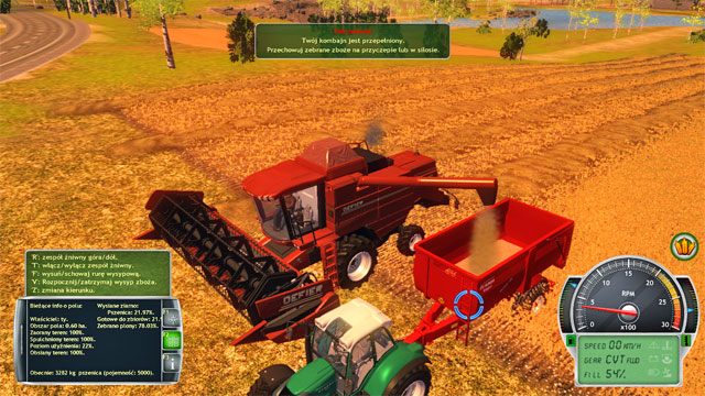 Gdy zbiornik kombajnu się napełni wysyp zboże na przyczepę. - Poznanie farmy i pierwsze prace | Kariera Symulator Farmy 2014 - Symulator Farmy 2014 - poradnik do gry