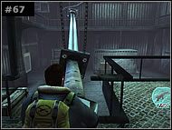 Wróć na kładkę, jednak nie wychodź po schodach na samą górę tylko po metalowym pręcie [#67] przejdź pod dach magazynu - [Misja 7 Pyron Hangar] Gorzej być już nie może | The Thing - The Thing - poradnik do gry