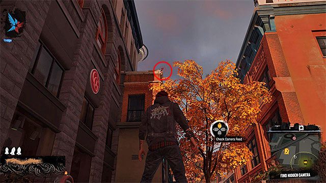 3) Ukryta kamera (Hidden Camera) - Poszukiwana kamera znajduje się w pokazanym na powyższym screenie miejscu - Seattle Centre - Trudniejsze aktywności - Miasto - inFamous: Second Son - poradnik, opis przejścia, miasto