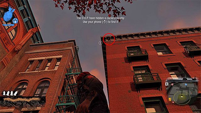 2) Ukryta kamera (Hidden Camera) - Poszukiwana kamera znajduje się w pokazanym na powyższym screenie miejscu - Georgetown - Trudniejsze aktywności - Miasto - inFamous: Second Son - poradnik, opis przejścia, miasto