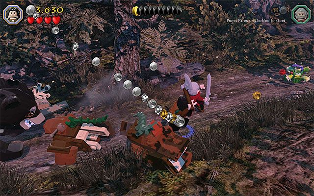 W trakcie ucieczki przed niedźwiedziem zbieraj monety i minizestawy - Etap 9 (Queer Lodgings) - Atak niedźwiedzia - LEGO The Hobbit - poradnik do gry