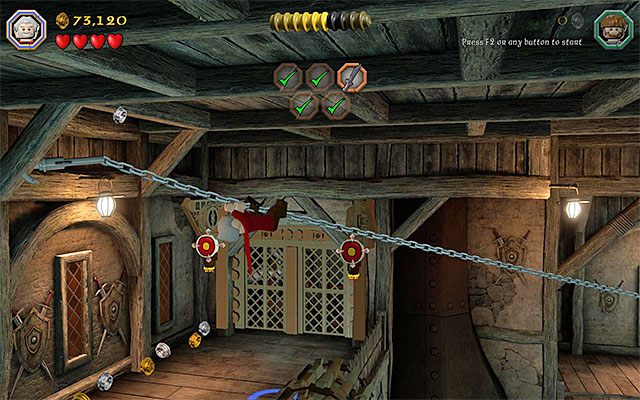 Musisz przejść po łańcuchu na lewy balkonik - Etap 12 (A Warm Welcome) - Zbrojownia - LEGO The Hobbit - poradnik do gry