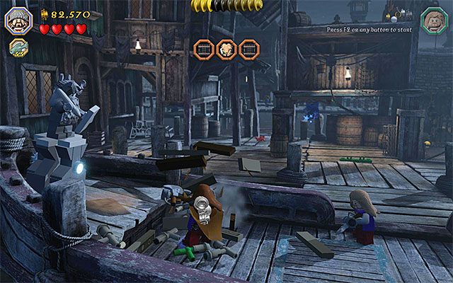 Okręt ze statuą i obiektami potrzebnymi do skonstruowania drabiny - Etap 12 (A Warm Welcome) - Doki - LEGO The Hobbit - poradnik do gry