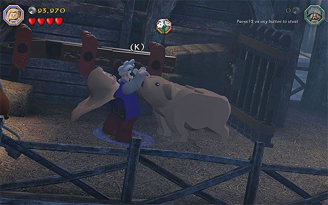 Musisz wygrać mini-grę żeby odebrać świni lekarstwo - Etap 12 (A Warm Welcome) - Doki - LEGO The Hobbit - poradnik do gry