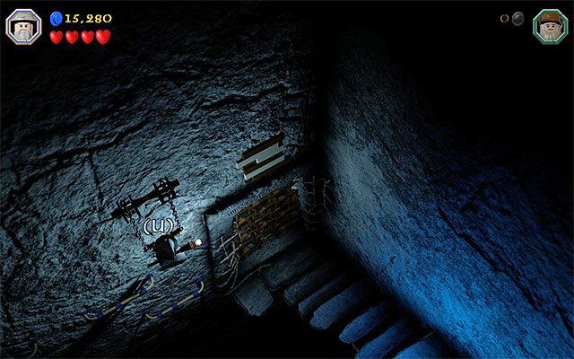 Eksplorację grobowca najlepiej rozpocząć od skorzystania ze statuy zapisu stanu gry (Save Statue) - Etap 13 (Looking for Proof) - Grobowiec czarnoksiężnika z Angmaru - LEGO The Hobbit - poradnik do gry