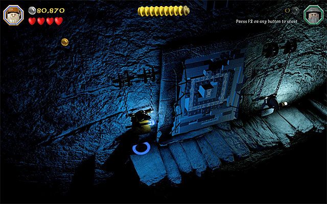 Uchwyty znajdują się na lewo i na prawo od bramy - Etap 13 (Looking for Proof) - Grobowiec czarnoksiężnika z Angmaru - LEGO The Hobbit - poradnik do gry