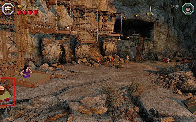 Eksplorację nowej większej lokacji rozpocznij od uaktywnienia statuy zapisu stanu gry (Save Statue) - Etap 15 (On the Doorstep) - Wspinaczka - LEGO The Hobbit - poradnik do gry