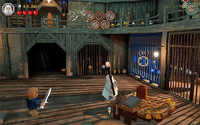 Musisz użyć laski żeby zniszczyć fragment klatki - Etap 12 (A Warm Welcome) - LEGO The Hobbit - poradnik do gry