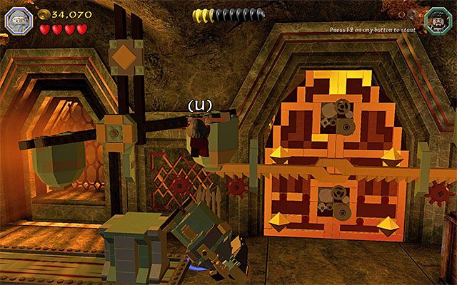 Musisz złapać się dźwigni i pozostać w takiej pozycji - Etap 1 (Greatest Kingdom in Middle-Earth) - Wnętrze Samotnej Góry - LEGO The Hobbit - poradnik do gry