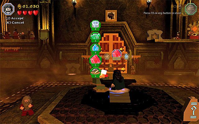 Wybieraj kolejne surowce i potwierdzać chęć ich poświęcenia na rzecz wykucia potrzebnego klucza - Etap 1 (Greatest Kingdom in Middle-Earth) - Wnętrze Samotnej Góry - LEGO The Hobbit - poradnik do gry