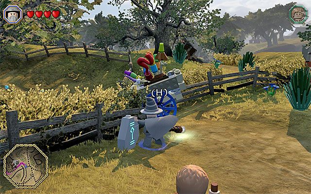 Użyj laski Gandalfa na obiekcie na obiekcie blokującym dalsze przejście - Śródziemie - Podróż do Bree - LEGO The Hobbit - poradnik do gry