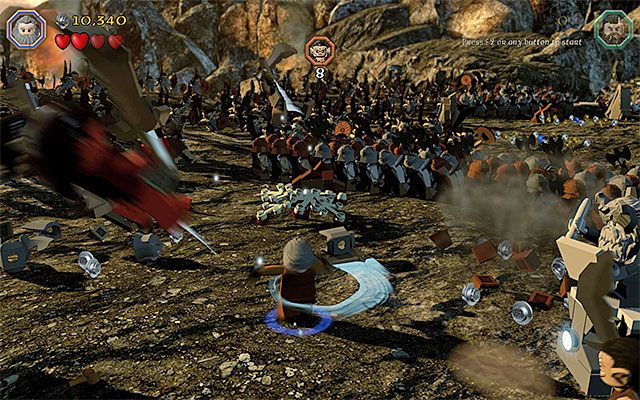 Ataki ładowane są dobre do pozbywania się grup potworów - Etap 3 (Azog the Defiler) - Bitwa z orkami - LEGO The Hobbit - poradnik do gry