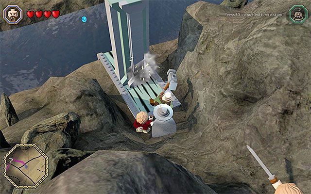 Musisz popchnąć blok z użyciem młota Dwalina - Śródziemie - Dotarcie do Siedzib Trolli - LEGO The Hobbit - poradnik do gry