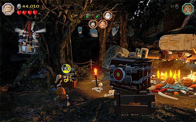 Użyj pokrętła żeby zniszczyć klatkę z więźniem - Etap 4 (Roast Mutton) - Uratowanie sojuszników - LEGO The Hobbit - poradnik do gry