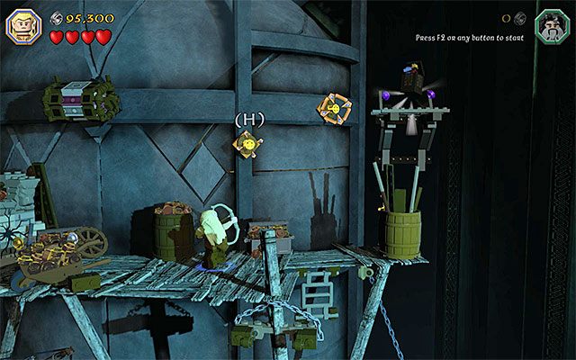 Skorzystaj z łuku i następnie z opcji dalekich skoków - Etap 16 (Inside Information) - LEGO The Hobbit - poradnik do gry
