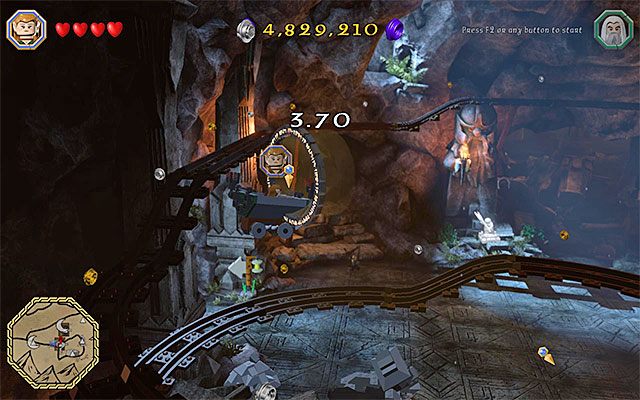 Musisz wciskać w odpowiednich momentach klawisz skoku żeby przelatywać przez pierścienie - Białe pytajniki - opisy przejścia zadań (41-60) - LEGO The Hobbit - poradnik do gry