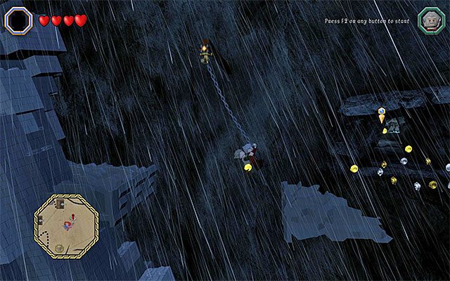 Możesz złapać się zaczepu grając jako Dori i doskoczyć do niego goblinem - Białe pytajniki - opisy przejścia zadań (61-80) - LEGO The Hobbit - poradnik do gry