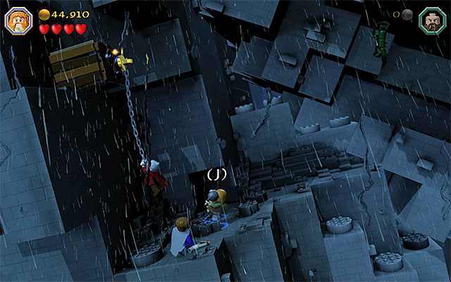 Po tym jak Dori złapie się zaczepu musisz doskoczyć do niego dowolną inną postacią - Etap 6 (Over Hill and Under Hill) - Wspinaczka po kamiennym olbrzymie - LEGO The Hobbit - poradnik do gry