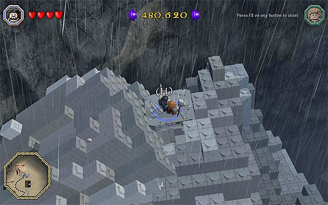 Musisz ustawić się na płycie i odpalić atak akcji zespołowej - Śródziemie - Dotarcie do miejsca schronienia się przed burzą - LEGO The Hobbit - poradnik do gry