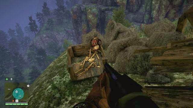 Maska ta umieszczona jest na twarzy kościotrupa, w drewnianym pudle, tuż przy krawędzi skarpy - Północny i północno-wschodni Kyrat | Maski Yalunga | Far Cry 4 - Far Cry 4 - poradnik do gry