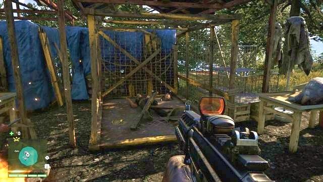 Maskę znajdziesz w rogu klatki znajdującej się koło ogniska - Południowy i centralny Kyrat | Maski Yalunga | Far Cry 4 - Far Cry 4 - poradnik do gry