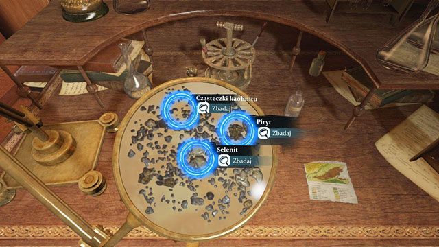 Rozpoznaj pod mikroskopem selenit (pośrodku), piryt (nieco u góry po prawej) i kaolinit (u góry nieco po lewej) - Zbadaj pobrane próbki - Krwawa łaźnia - Sherlock Holmes: Zbrodnia i kara - poradnik do gry