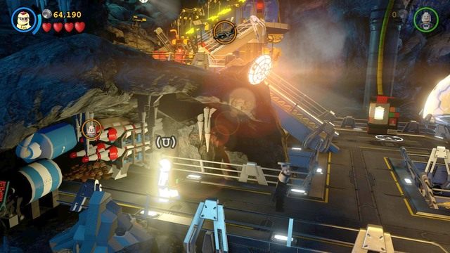 Podejdź do ciemnej jaskini po lewej stronie i oświetl drogę Robinem - Batmolka | Opis przejścia Lego Batman 3 Poza Gotham - LEGO Batman 3: Poza Gotham - poradnik do gry