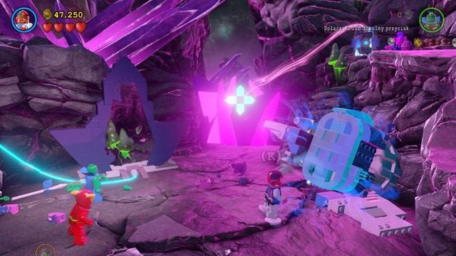 Po dotarciu do kolejnej strefy zmień postać na Cyborga i zniszcz wielki obiekt obok skały po prawej stronie - Miłość Ci Wszystko Wybaczy | Opis przejścia Lego Batman 3 Poza Gotham - LEGO Batman 3: Poza Gotham - poradnik do gry