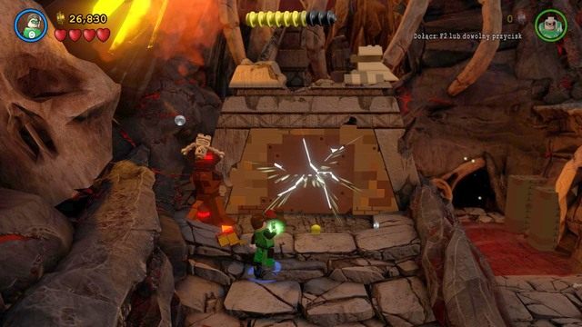 W miejscu pokazanym na obrazku przejmij kontrolę nad Grundym i zniszcz świecącą ścianę - Wyrzuć Ten Gniew | Opis przejścia Lego Batman 3 Poza Gotham - LEGO Batman 3: Poza Gotham - poradnik do gry