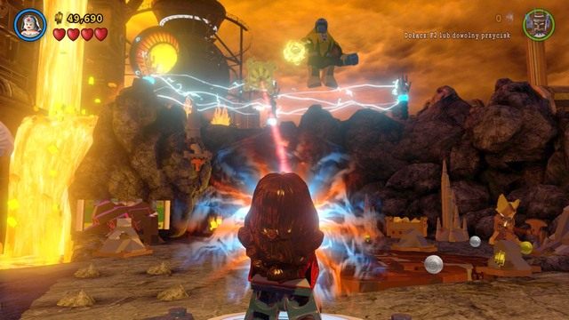 Po przejściu przez maszynę zaatakuje się broń laserowa - Qwardy Orzech Do Zgryzienia | Opis przejścia Lego Batman 3 Poza Gotham - LEGO Batman 3: Poza Gotham - poradnik do gry