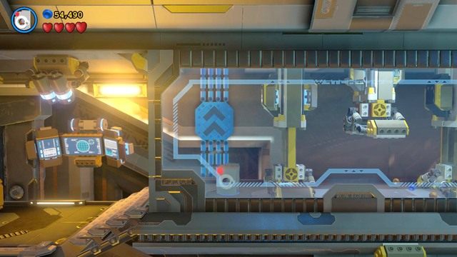 Podejdź do zablokowanego przejścia jako Cyborg w kostiumie maskującym i będąc w środku zmień go na kostium magnetyczny - Minizestawy | Może To Go Ściągnie Na Ziemię - sekrety w Lego Batman 3 - LEGO Batman 3: Poza Gotham - poradnik do gry