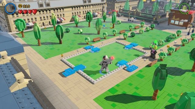 Na początku lokacji zmień postać na Cyborga i odchyl niebieskie zaciski na ziemi za pomocą stroju magnetycznego - Minizestawy | Eurokłopoty - sekrety - LEGO Batman 3: Poza Gotham - poradnik do gry