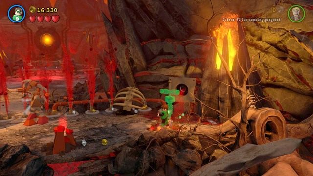 Po zebraniu ósmego minizestawu przeleć na skałę, przy której wchodzisz na arenę i wykop z ziemi po prawej stronie minizestaw - Minizestawy | Wyrzuć Ten Gniew - sekrety w Lego Batman 3 Poza Gotham - LEGO Batman 3: Poza Gotham - poradnik do gry