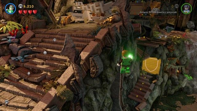 Czwarty minizestaw znajdziesz za złotymi drzwiami widocznymi na obrazku - Minizestawy | Sezon Na Pomarańcze - sekrety w Lego Batman 3 Poza Gotham - LEGO Batman 3: Poza Gotham - poradnik do gry