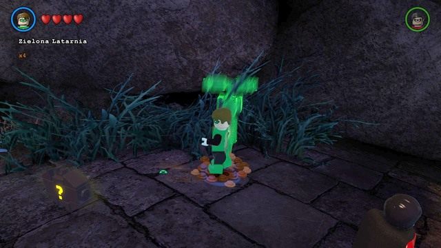 Podejdź w jaskini do kupki ziemi i wykop z niej żeton postaci - Postacie i pojazdy | Nok - sekrety w Lego Batman 3 Poza Gotham - LEGO Batman 3: Poza Gotham - poradnik do gry