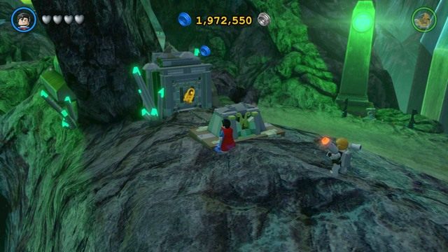 Zniszcz złotą kłódkę chroniącą drzwi za pomocą lasera Supermana i zmień postać na Robina - Złote Klocki | Oa - sekrety w Lego Batman 3 Poza Gotham - LEGO Batman 3: Poza Gotham - poradnik do gry