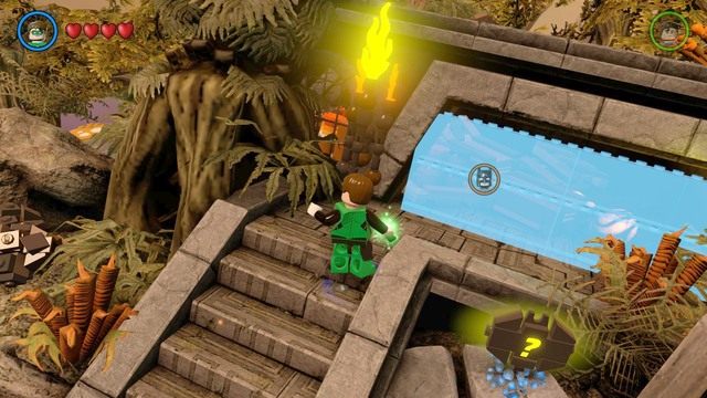 Po dotarciu na miejsce zniszcz szklaną osłonę Batmanem w kostiumie z sonarem i wejdź do środka - Złote Klocki | Okaara - sekrety w Lego Batman 3 Poza Gotham - LEGO Batman 3: Poza Gotham - poradnik do gry