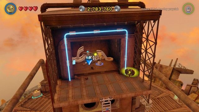 Dotrzesz do dużego budynku, w którym znajdziesz wymagany przedmiot - Zadania poboczne | Qward - sekrety - LEGO Batman 3: Poza Gotham - poradnik do gry