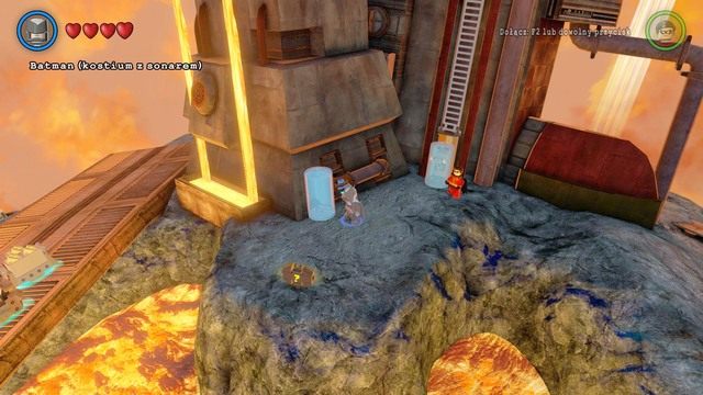 Zniszcz szklaną osłonę po prawej stronie żeby uzyskać dostęp do dźwigni - Złote Klocki | Qward - sekrety w Lego Batman 3 Poza Gotham - LEGO Batman 3: Poza Gotham - poradnik do gry